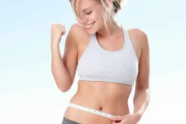 woman happy after fat reduction treatment Shropshire