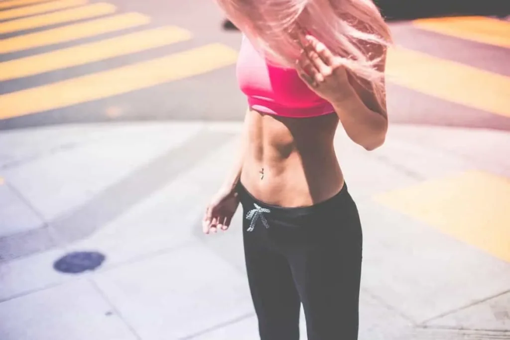 Woman with toned stomach after LA-EMS Body Sculpting Treatment Shropshire